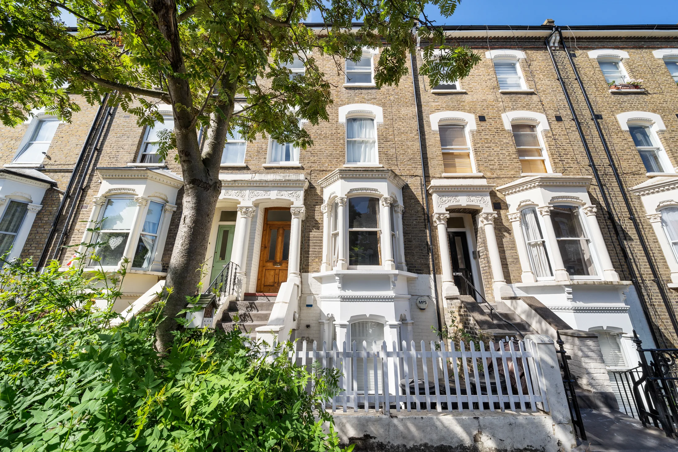 Terraced frontage on Crayford Road with planted front gardens