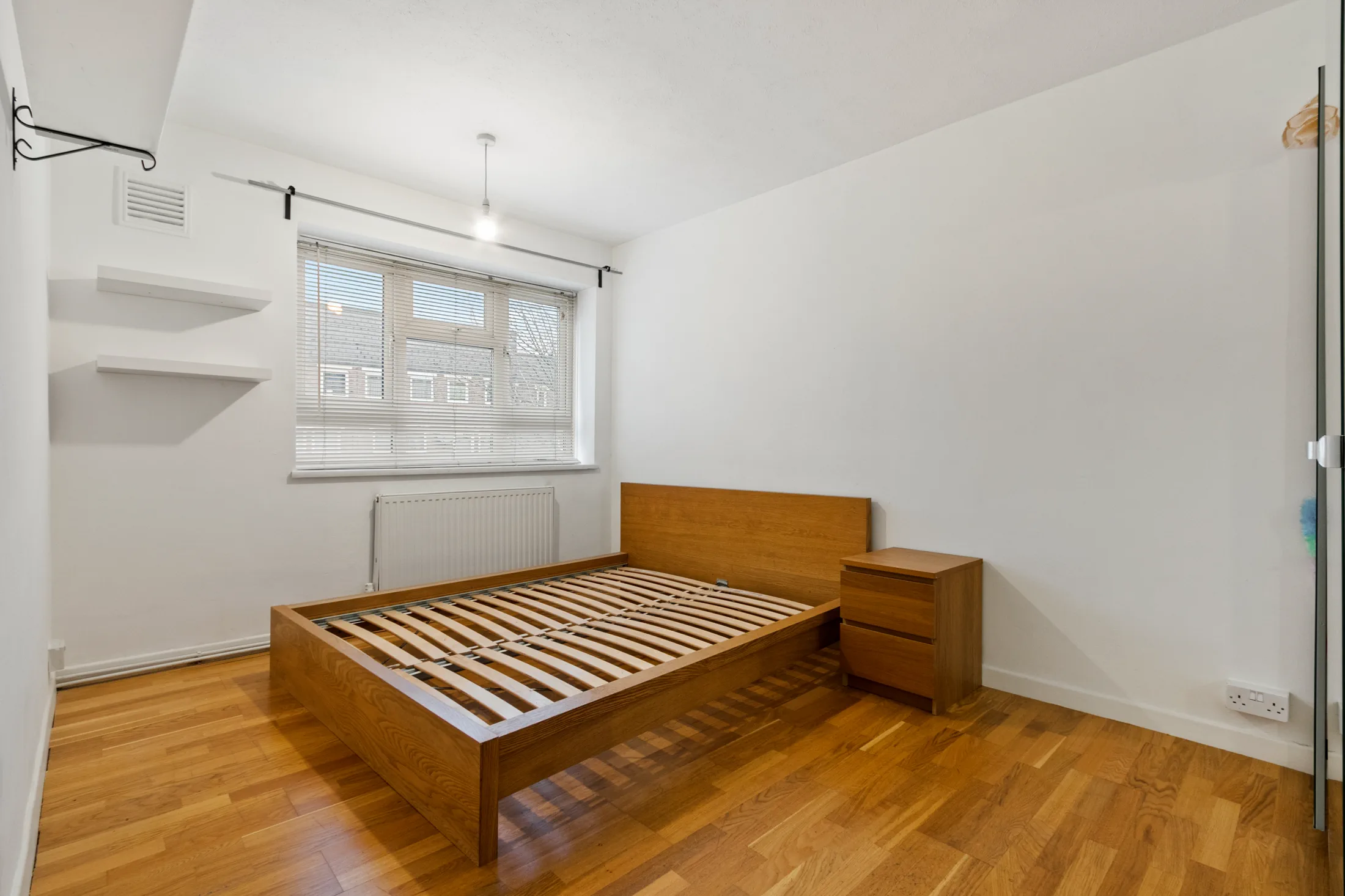 Bedroom with a double bed and wardrobe