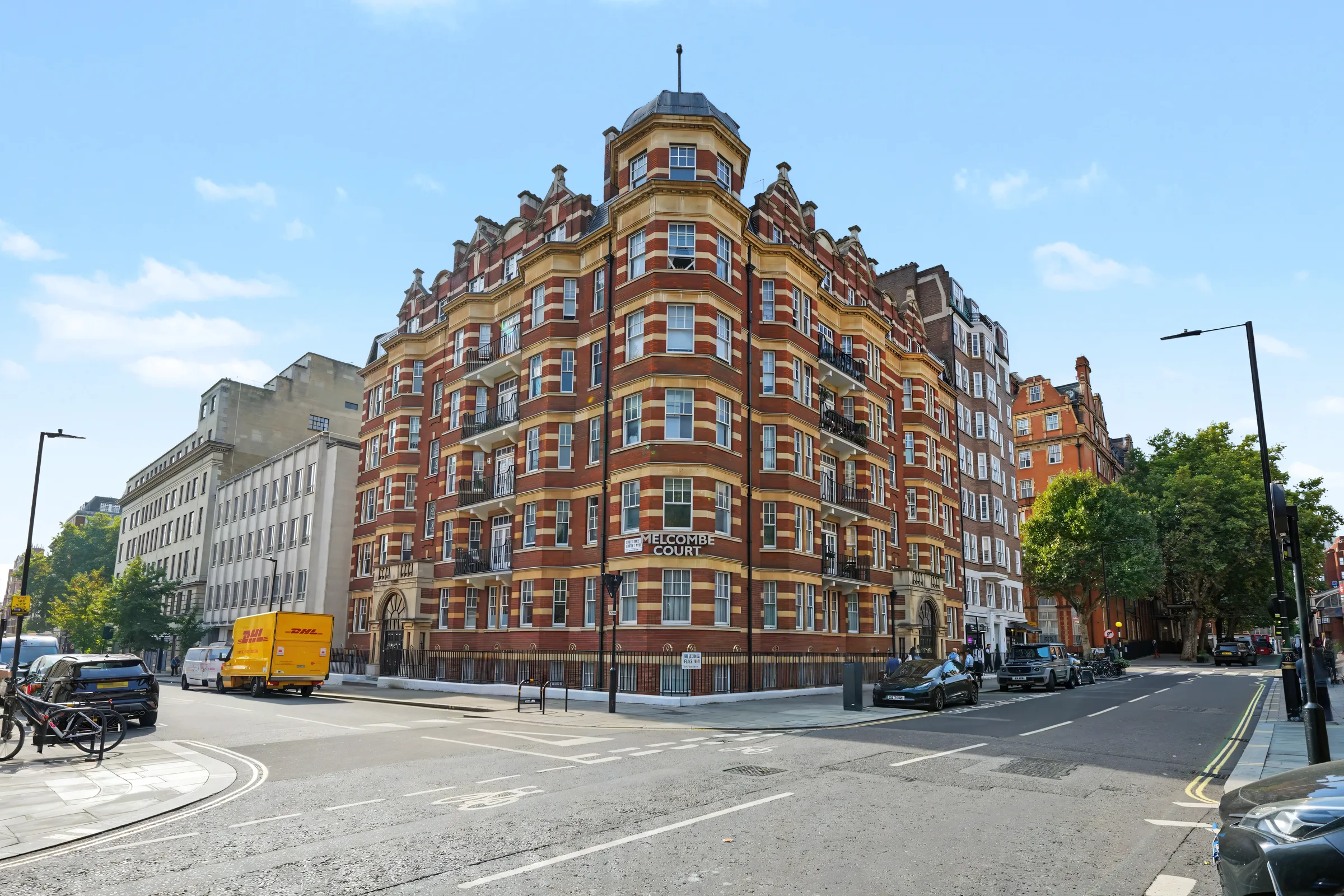 Red-brick Melcombe Court mansion block viewed from the street