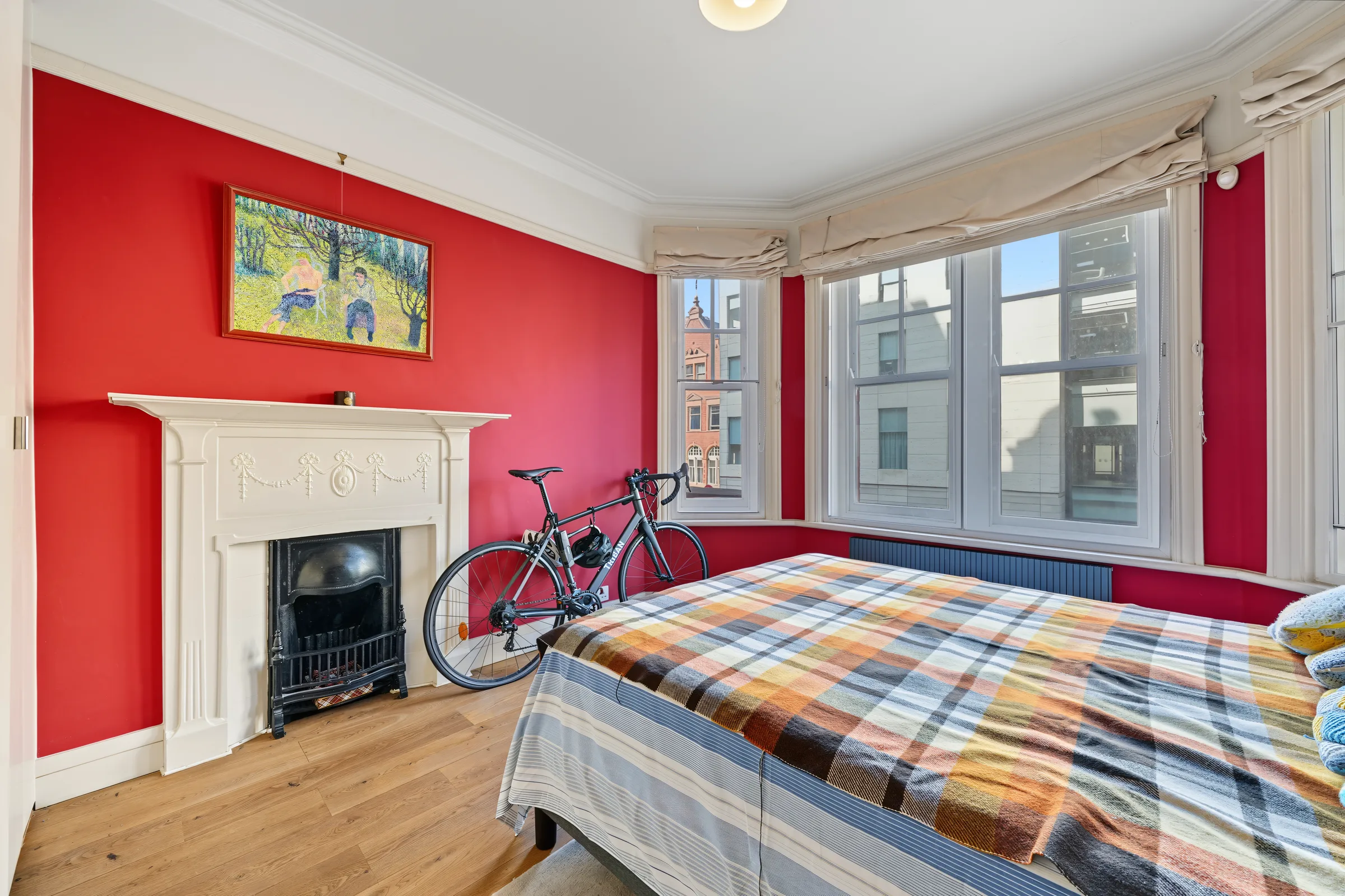 Second bedroom with a period fireplace