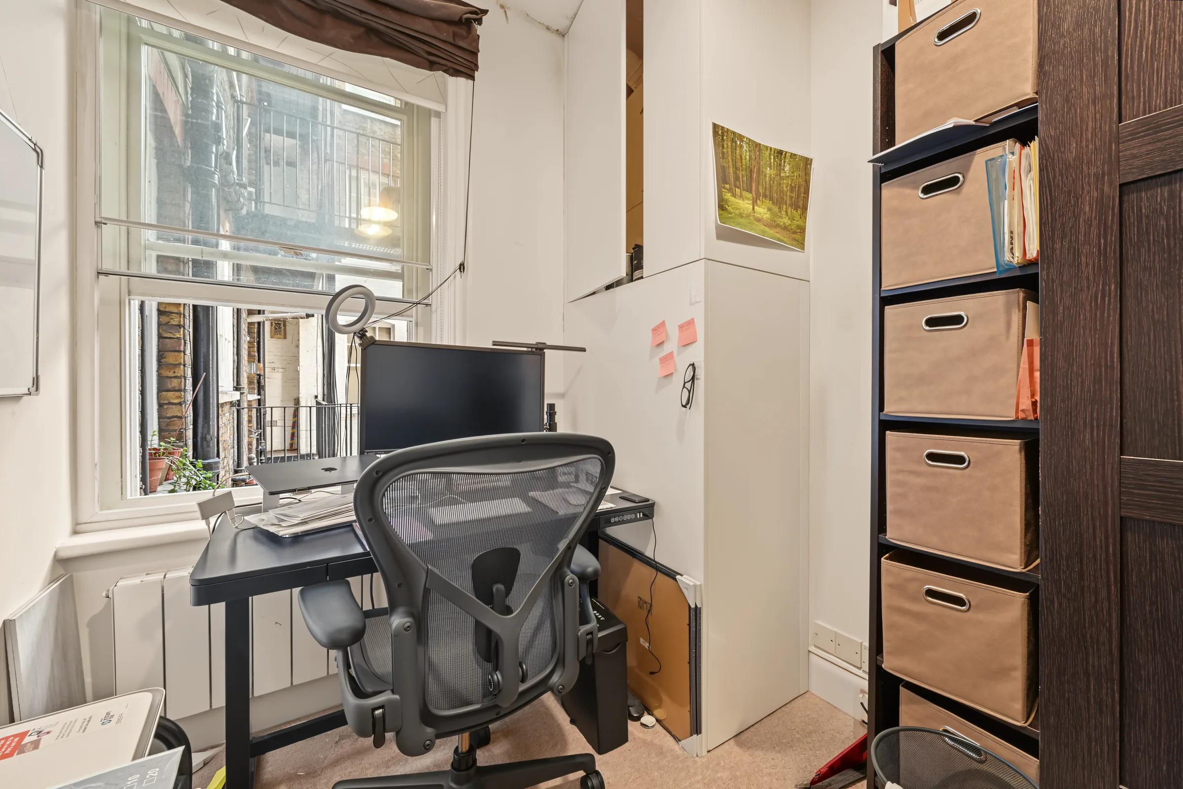 Third bedroom or home office with a window