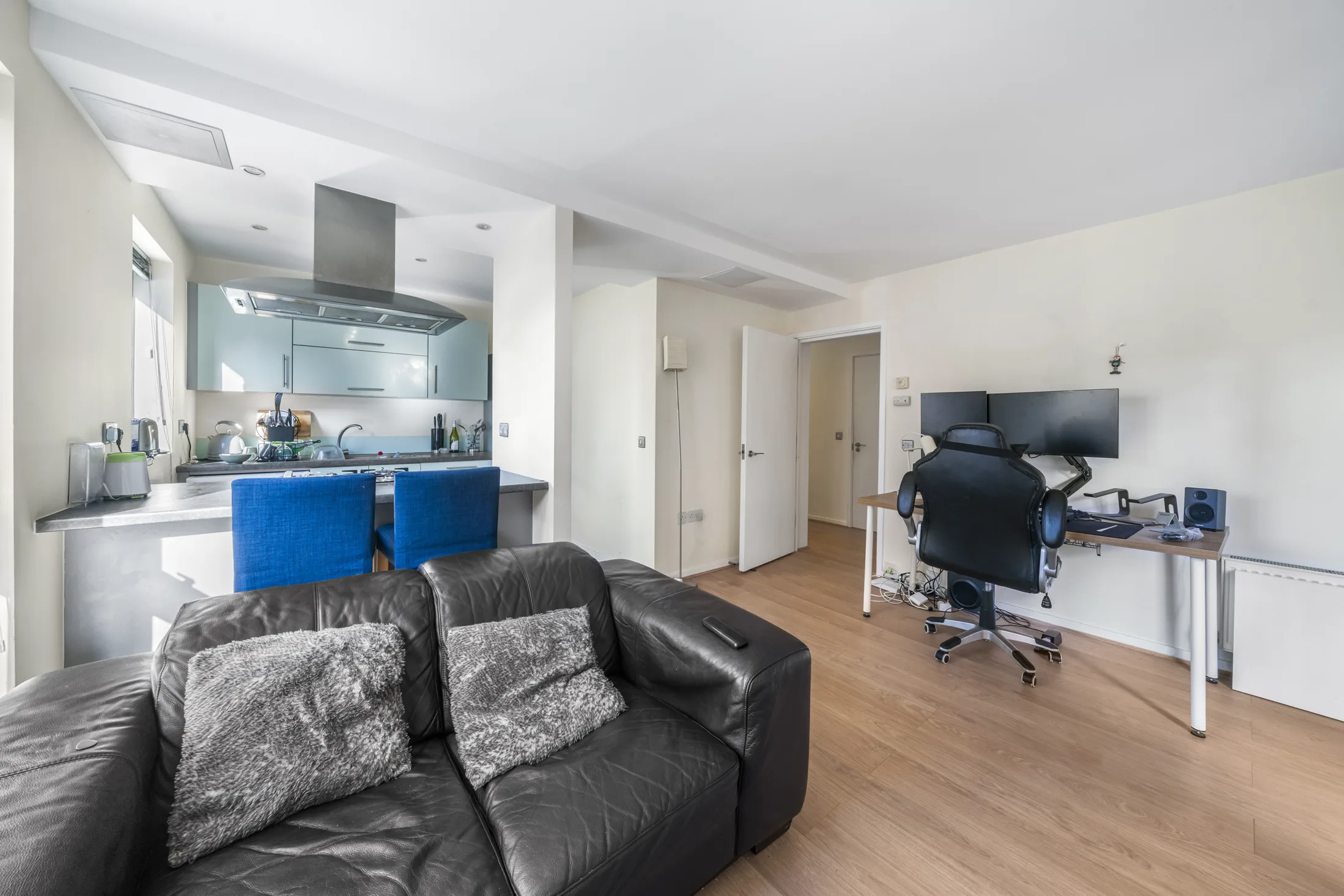 Reception room with seating, dining area and timber flooring