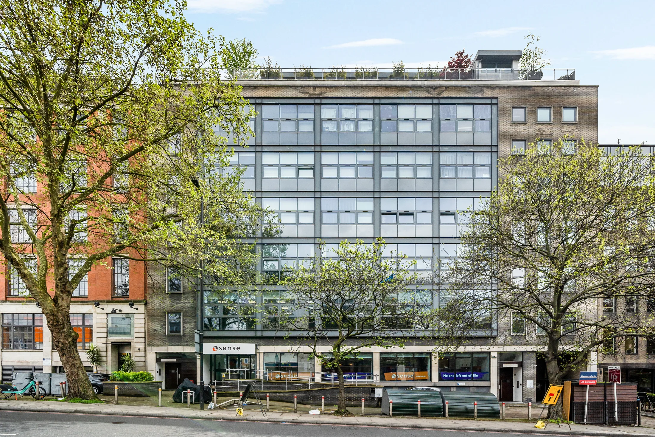 Exterior of the apartment building in daylight