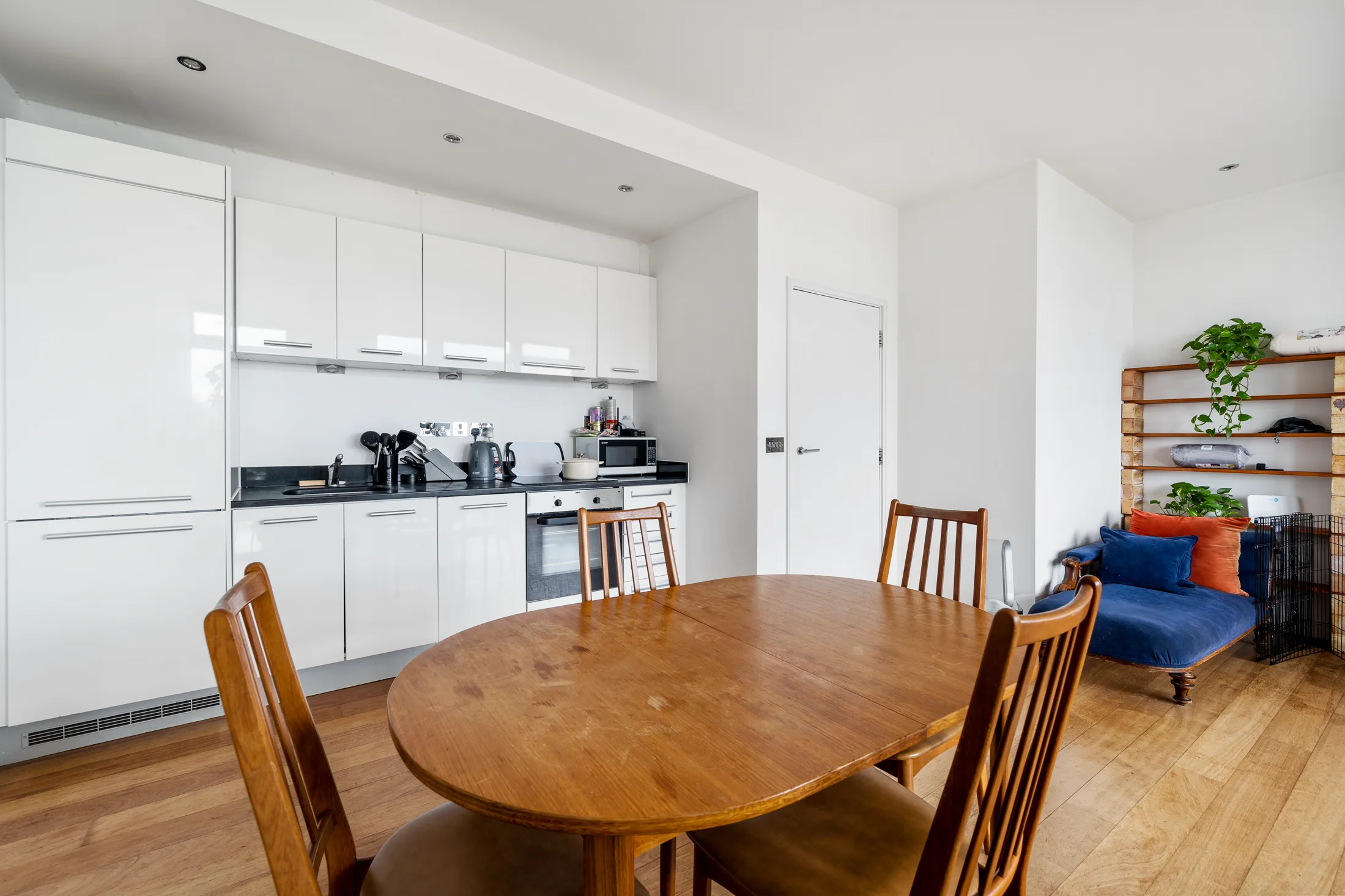 Dining area beside the fitted kitchen
