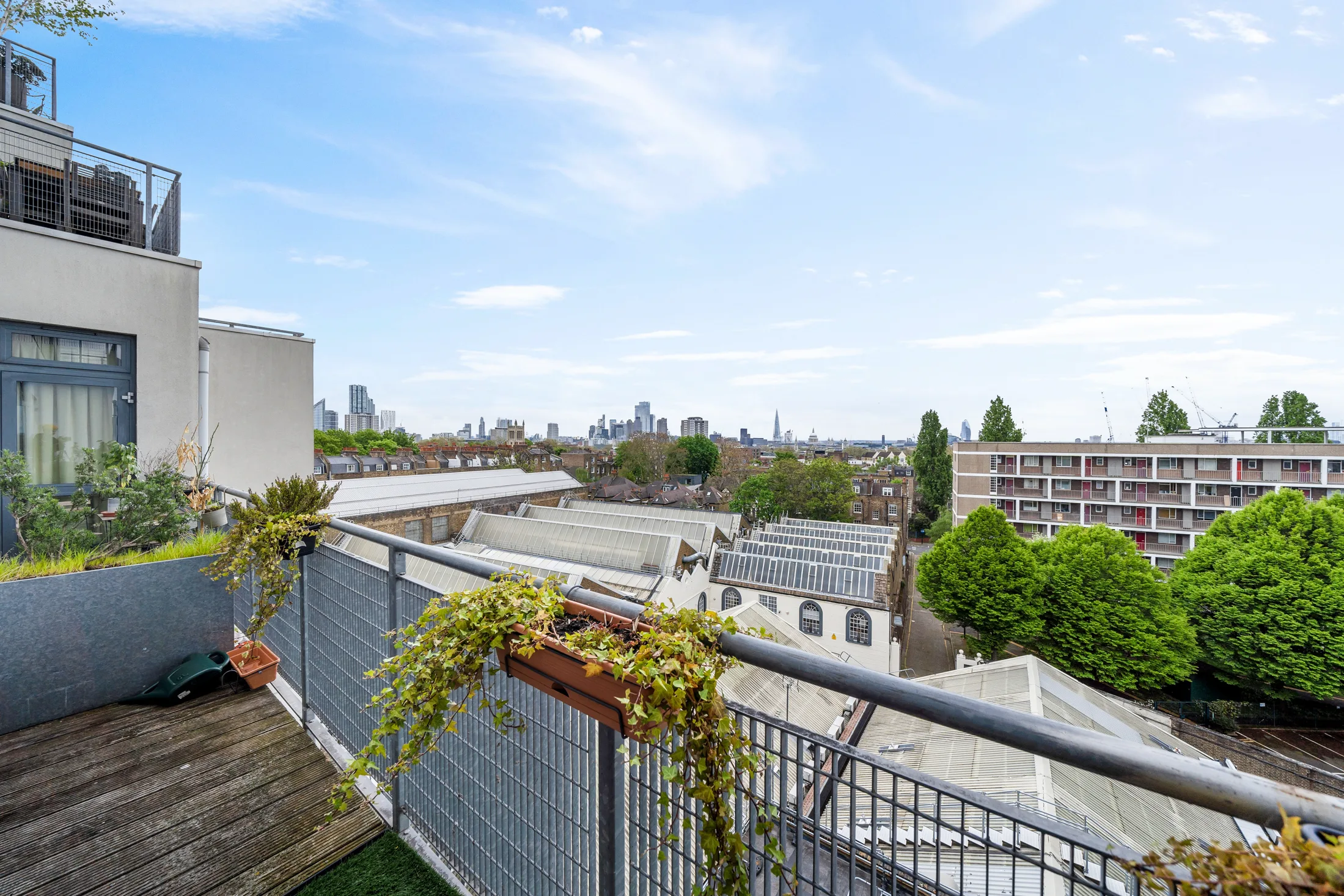 Balcony with views across London rooftops
