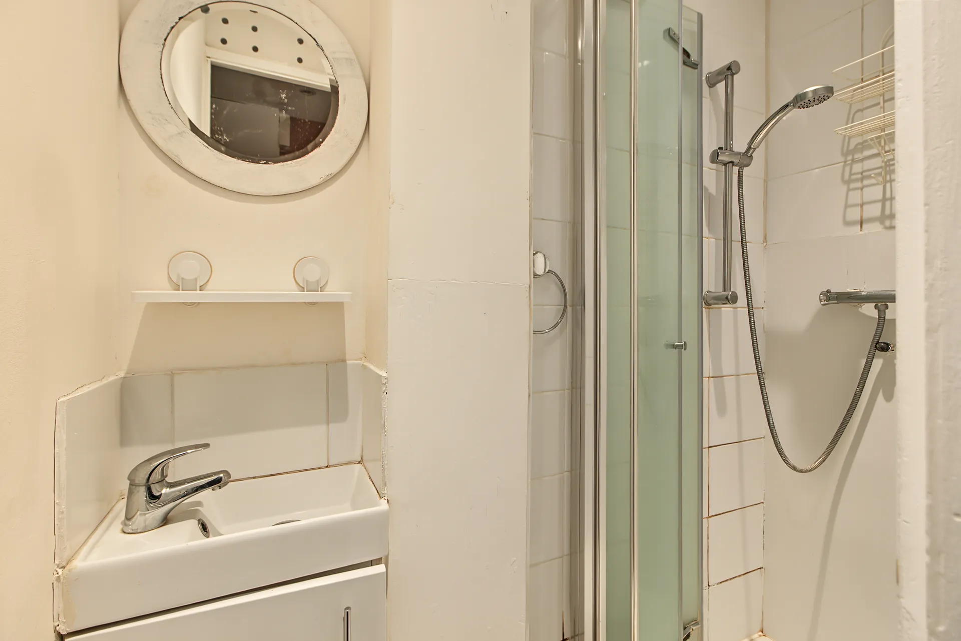 Shower room with a glass-screened shower and basin