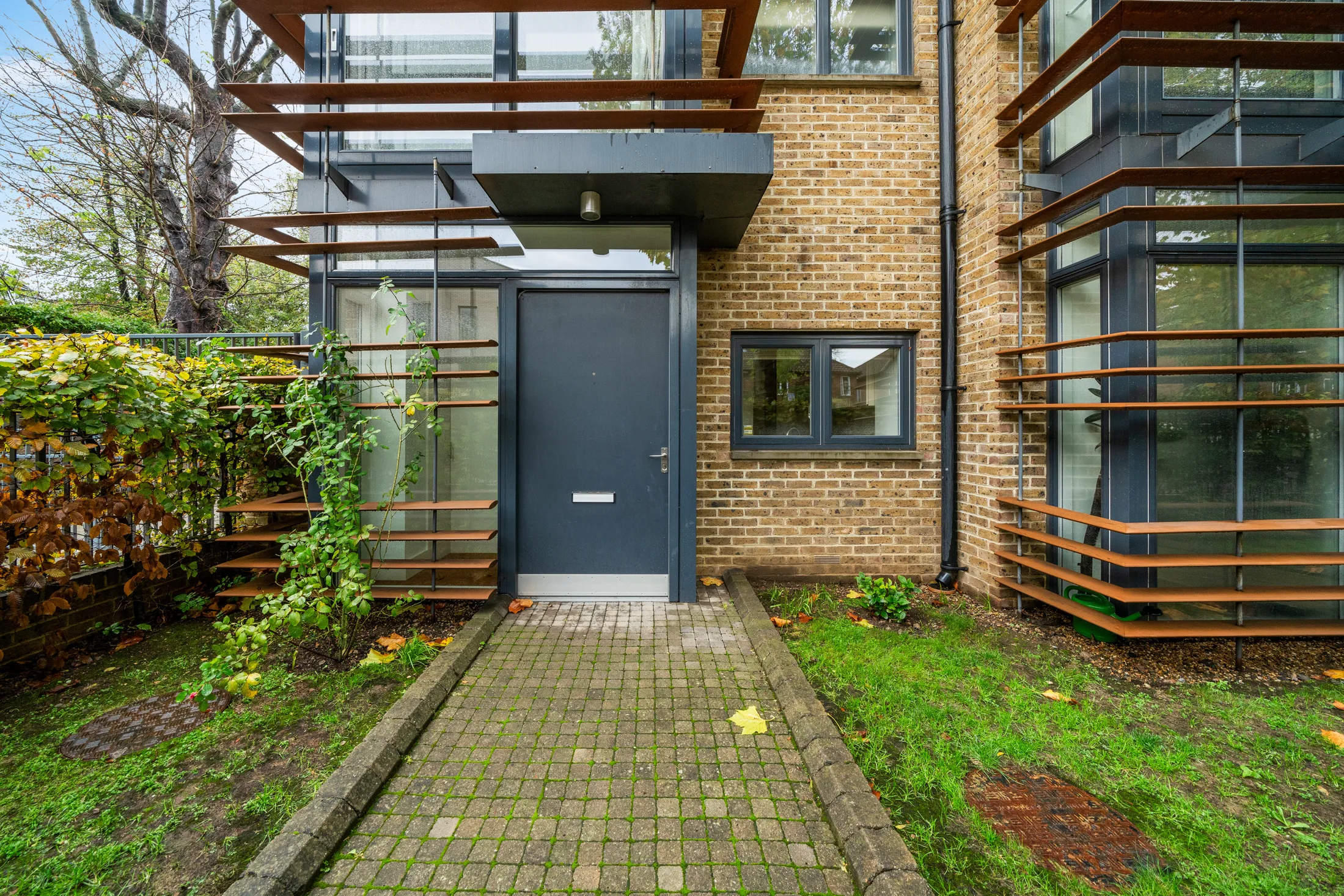 Treetop Mews entrance with planted front garden