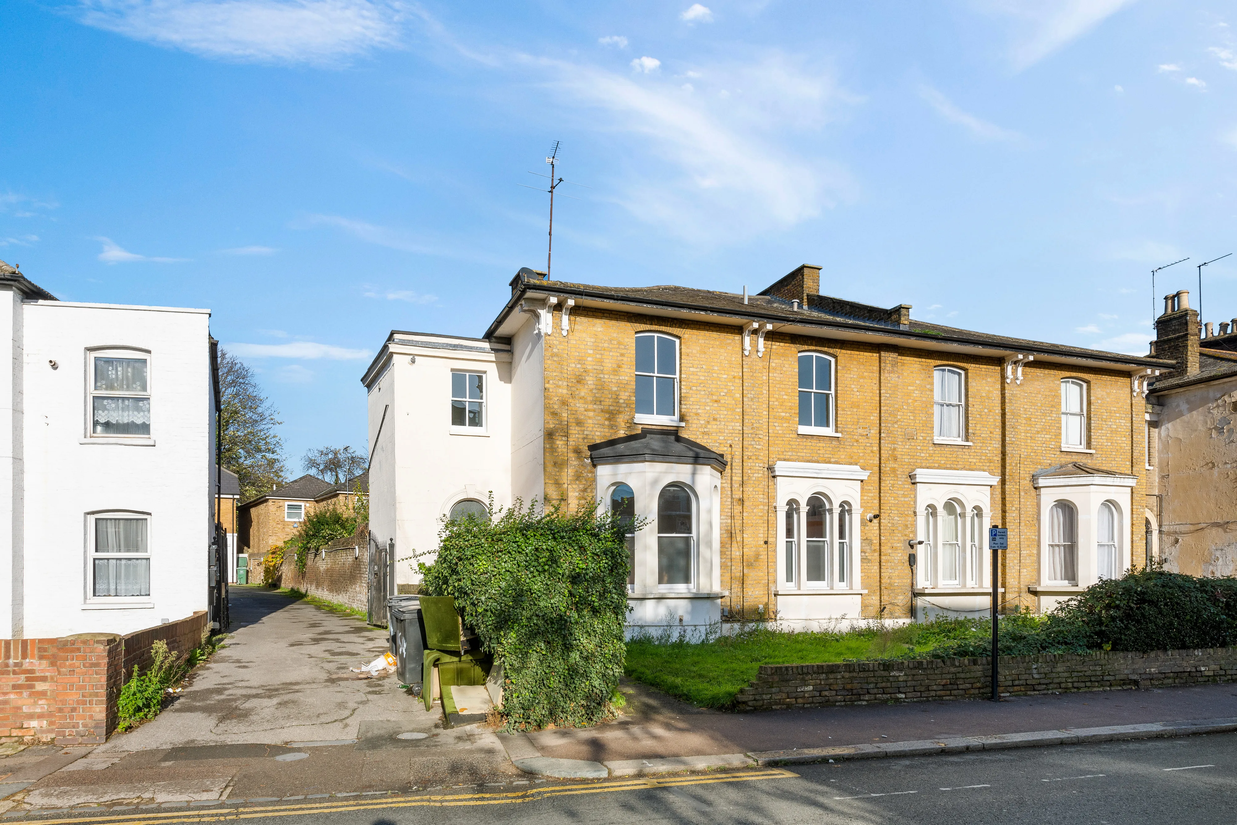 View across the garden and surrounding homes from the property