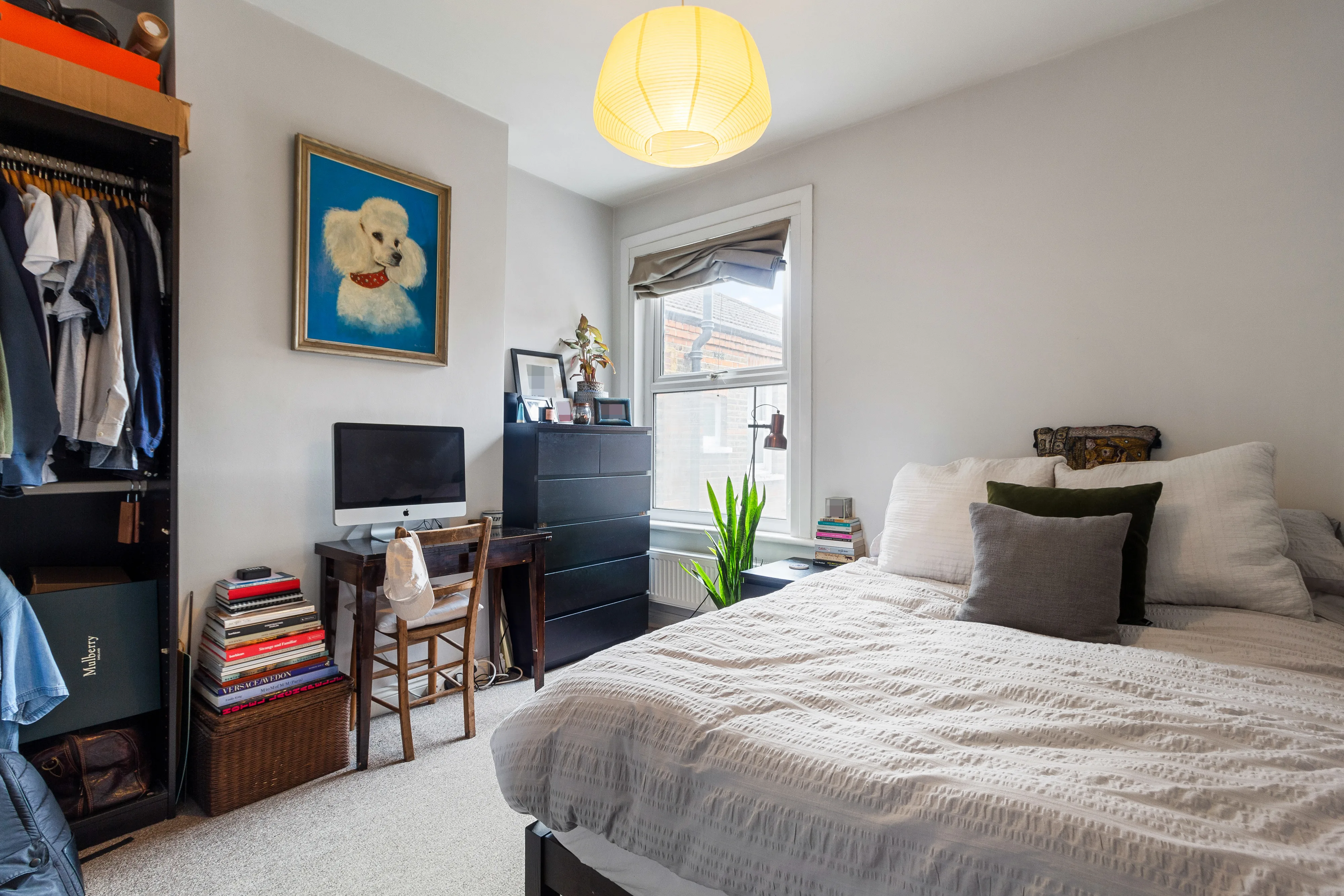 Bedroom with a bed and natural light