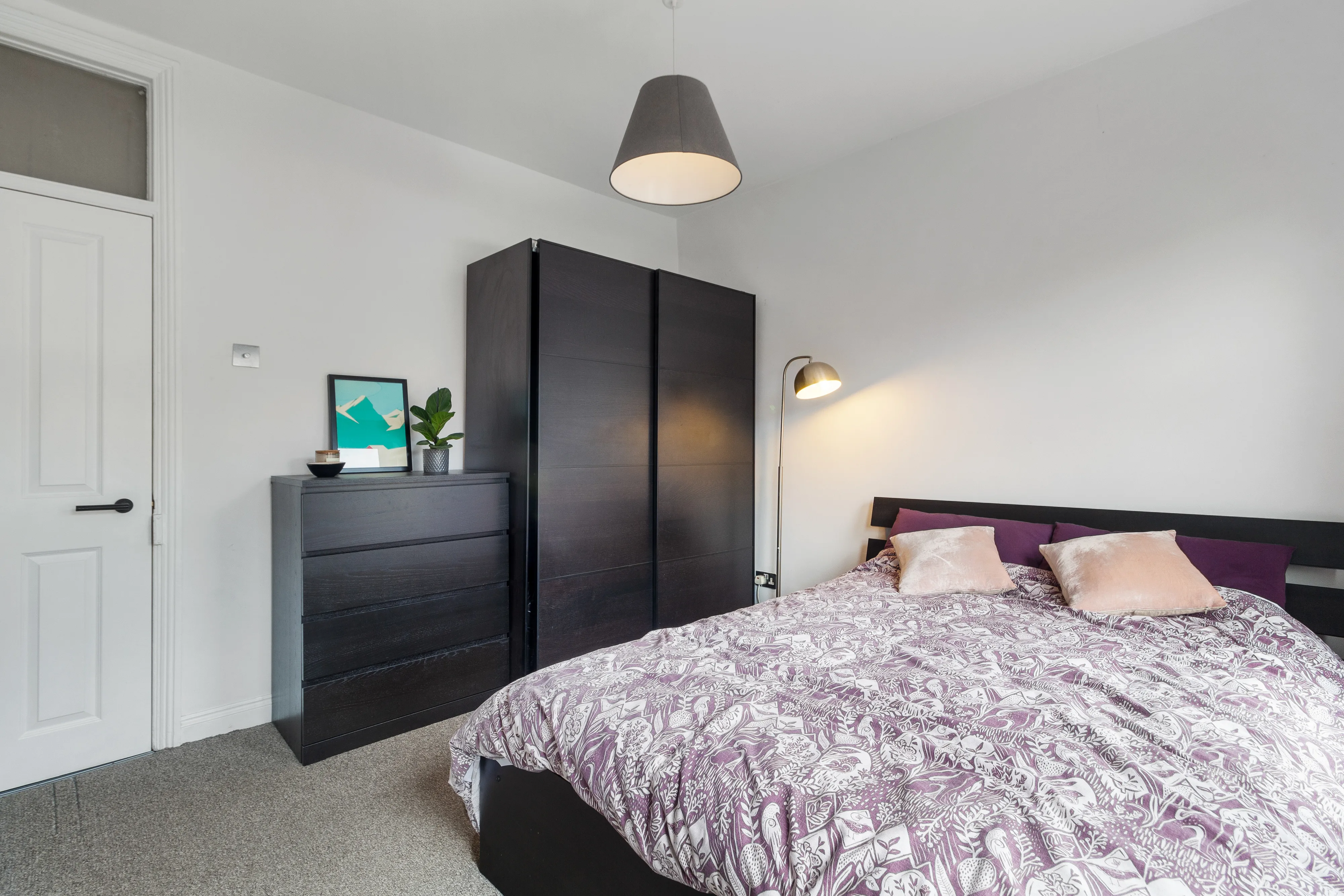 Bedroom with a double bed and window