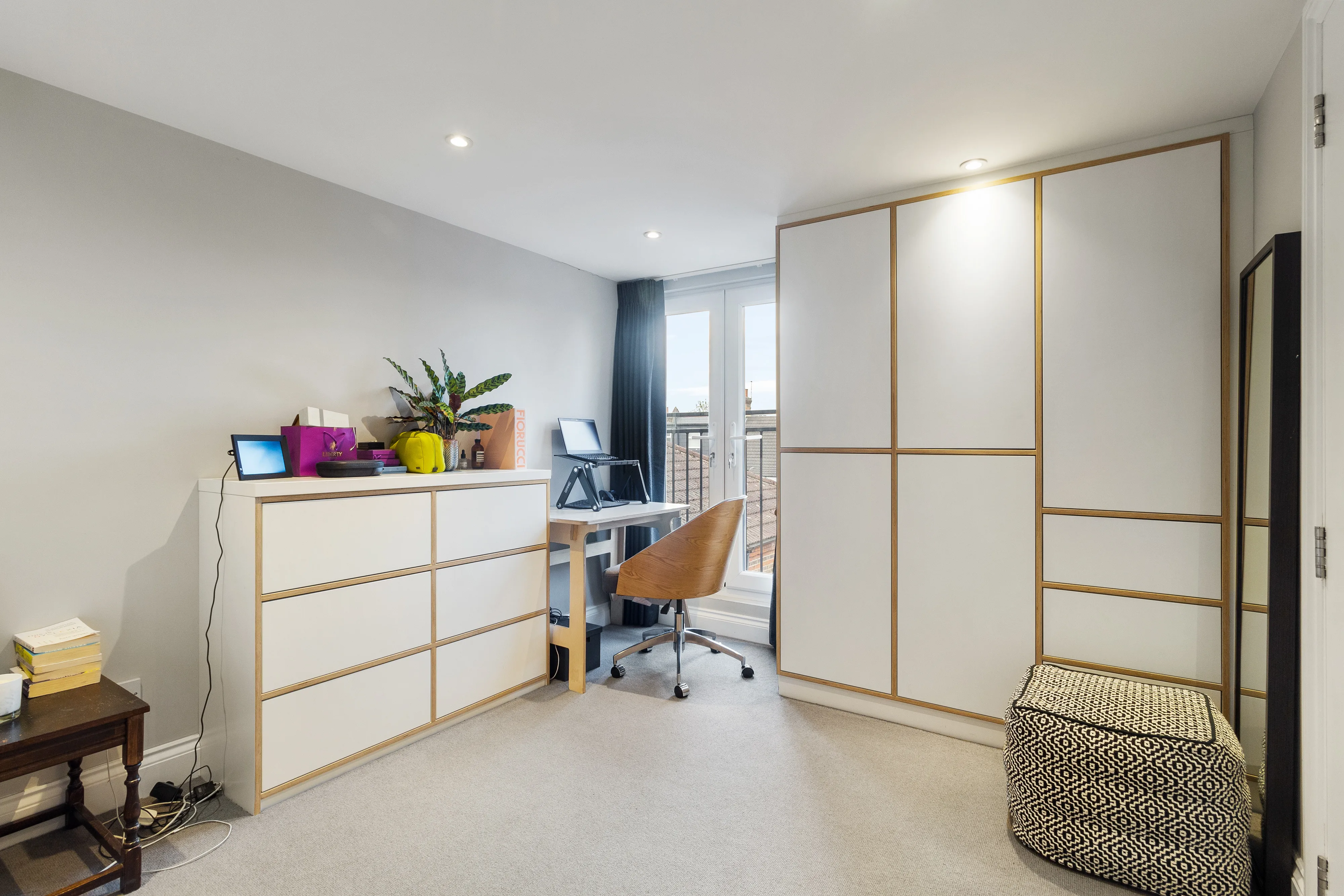 Bedroom with a bed and workspace
